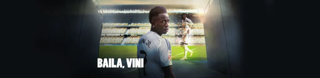 “Baila, Vini” es el título del documental sobre la vida del jugador de fútbol Vinícius Júnior nacido en Brasil y actual estrella del Real Madrid en España, que ya tiene fecha de estreno y detalles en el trailer que reveló recientemente Netflix, la plataforma de streaming por la que se podrá ver esta producción que fue anunciada en 2024.
